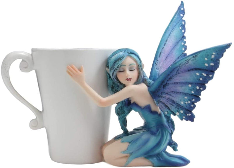 Ebros Amy Brown Warmth Comfort Blue Fairy Hugging Tea Cup Statue 4.25"H Fantasy