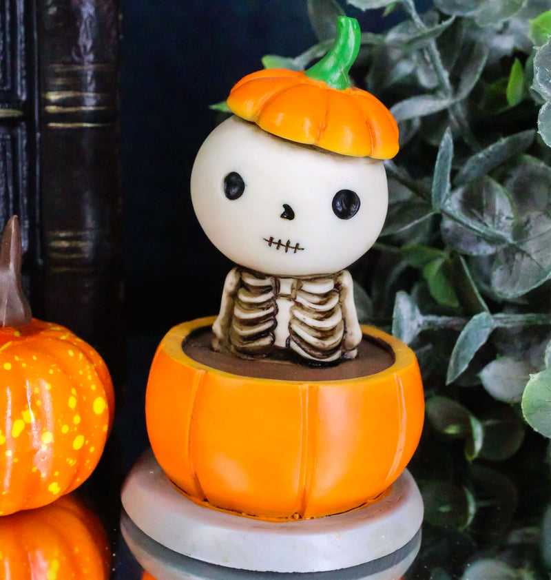 Lucky The Skeleton Jack O Lantern Bathing in Chocolate Soup Pumpkin Figurine