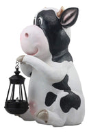 Ebros Country Farm Whimsical Holstein Cow Statue Holding Solar LED Lantern Light 14"H