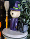 Lucky Skeleton In Witch Costume And Broomstick Standing By Black Cat Figurine