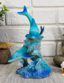 Marine Life Ocean Two Blue Dolphins Swimming Around Coral Reef Statue Sea World