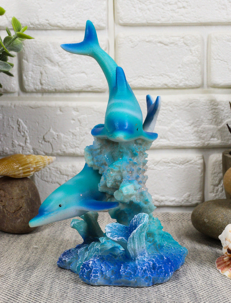 Marine Life Ocean Two Blue Dolphins Swimming Around Coral Reef Statue Sea World