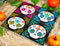 Ebros Calavera Baby Sugar Skulls DOD Ceramic Coaster Set 4 Corked Tiles
