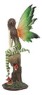 Whimsical Peppermint Elf Fairy Sitting On Tree Stump Statue 9.5"Tall Collectible