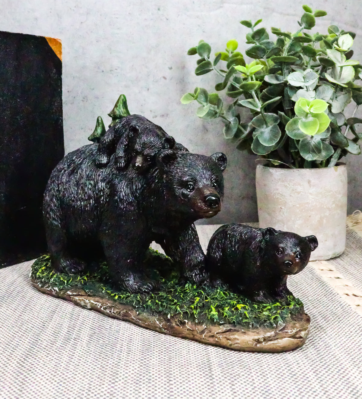 7.75" Long Realistic Black Momma Bear Piggybacking Her Cub By A Pine Tree Statue