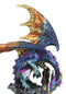 Metallic Blue Iridescent Dragon Protecting Castle On Mountain Cliff Figurine