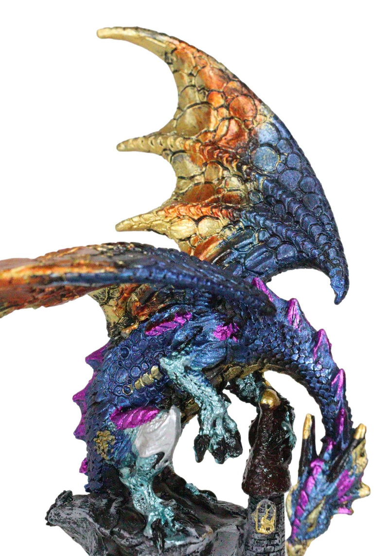 Metallic Blue Iridescent Dragon Protecting Castle On Mountain Cliff Figurine