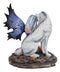 Ebros Fairy With Wolf 6.25"H Primrose Fairy Kneeling With Arctic Wolf Figurine
