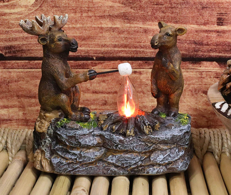 Ebros Rustic Elk Moose Father & Son Making Smores On Twig By Bonfire Night Light