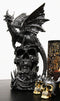 Large Gothic Guardian Behemoth Winged Dragon Standing On Graveyard Skull Statue