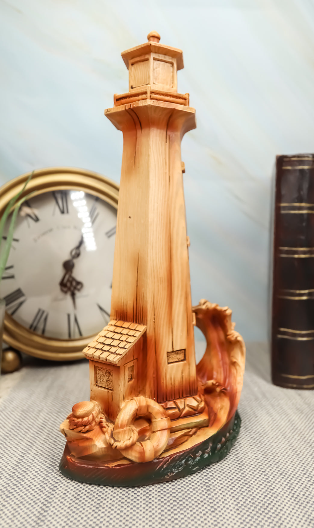 Ebros 9"H Nautical Lighthouse With Life Ring Buoy And Crashing Ocean Wave Statue