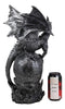 Large Gothic Guardian Behemoth Winged Dragon Standing On Graveyard Skull Statue