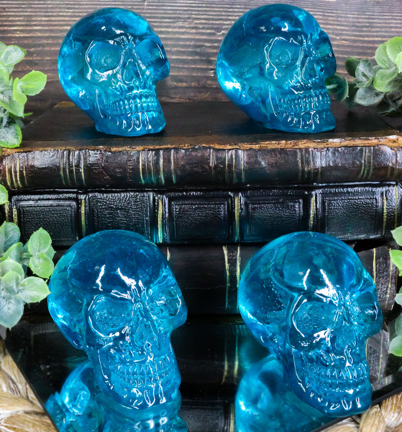 Set Of 4 Blue Translucent Witching Hour Gazing Skull Acrylic Miniature Figurines