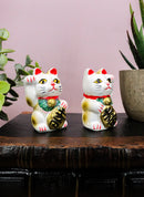 Ebros Japanese Luck and Fortune Charm White Beckoning Cat Maneki Neko Ceramic Figurines Set of 2 with Right and Left Paws Feng Shui Lucky Energy Cats Collectible Statues