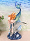 Ebros Red Haired Mermaid Riding Dolphin Over The Ocean Waves Figurine 10.25" H