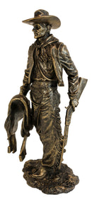 Old World Rustic Western Cowboy Holding Horse Saddle and Rifle Gun Statue 12"H