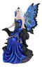 Gothic Raven Crow Fairy Queen in Blue Gown Sitting On Throne of Crows Statue