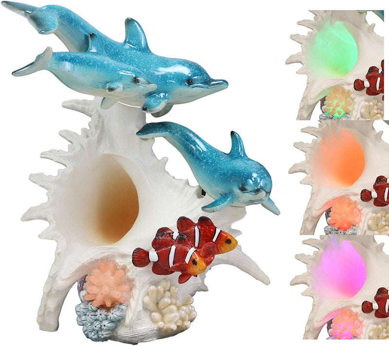 Ebros Nautical Ocean Family 3 Dolphins Swimming Over Giant Sea Conch Clownfishes and Anemones Statue with Colorful LED Light 9.5" Tall
