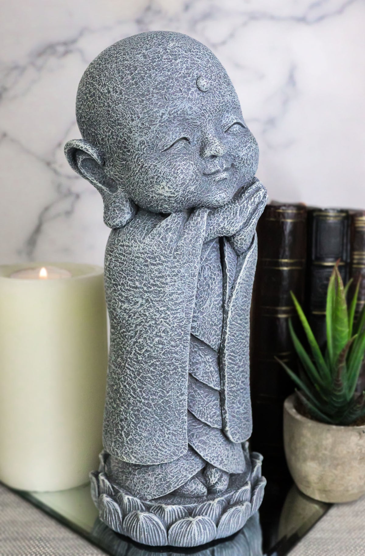 Ebros Japanese Jizo Monk Standing On Lotus Figurine 9.75"H (Hands On Left Cheek)