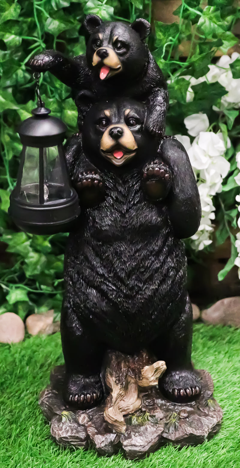 Ebros Rustic Black Bear Carrying Cub On Shoulder Statue 18.75"Tall With Solar LED Lantern Light Bear Family Guest Greeter"This Little Light Of Mine" Realistic Wildlife Black Bear Decor