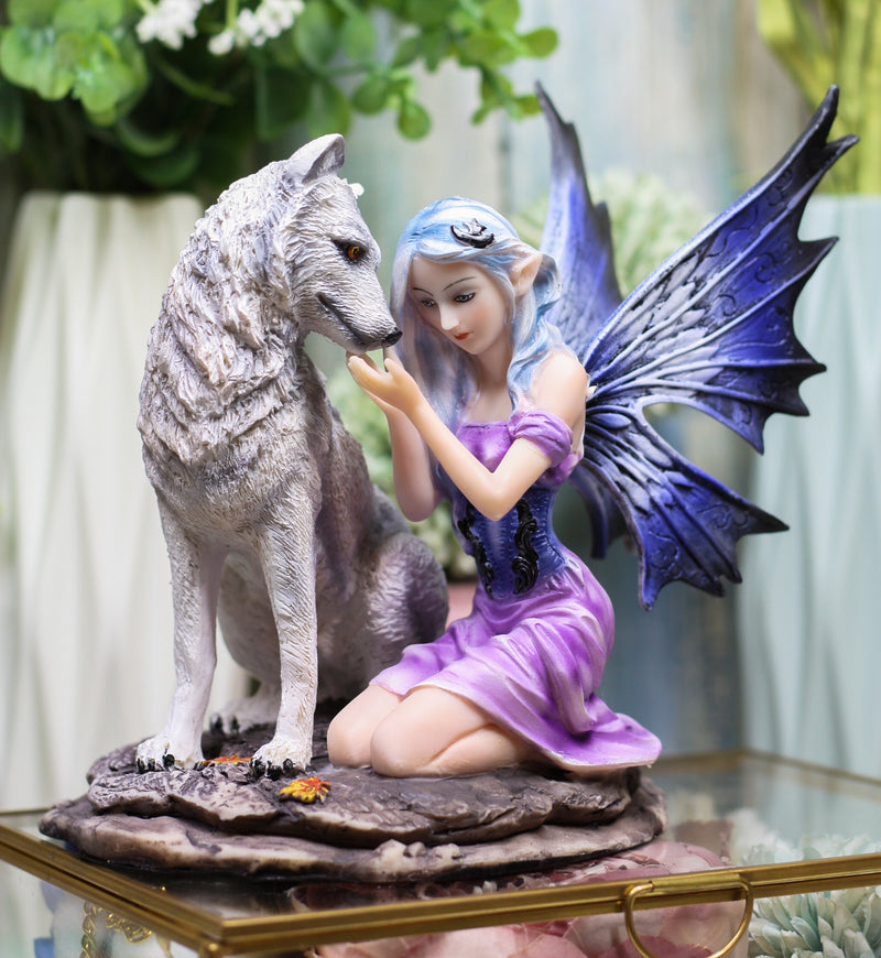 Ebros Fairy With Wolf 6.25"H Primrose Fairy Kneeling With Arctic Wolf Figurine