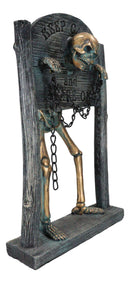 Grinning Skeleton Prisoner Chained At Pillory Keep Calm Scare On Sign Figurine