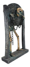 Grinning Skeleton Prisoner Chained At Pillory Keep Calm Scare On Sign Figurine