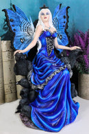 Gothic Raven Crow Fairy Queen in Blue Gown Sitting On Throne of Crows Statue