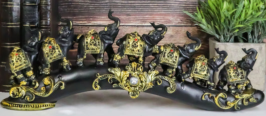Elephant Herd On Great Migration On Black Tusk With Golden Scrollwork Figurine