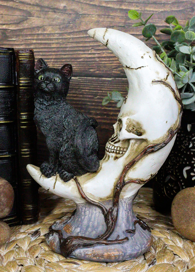 Witching Hour Halloween Black Cat Sitting On Crescent Moon Skull Figurine